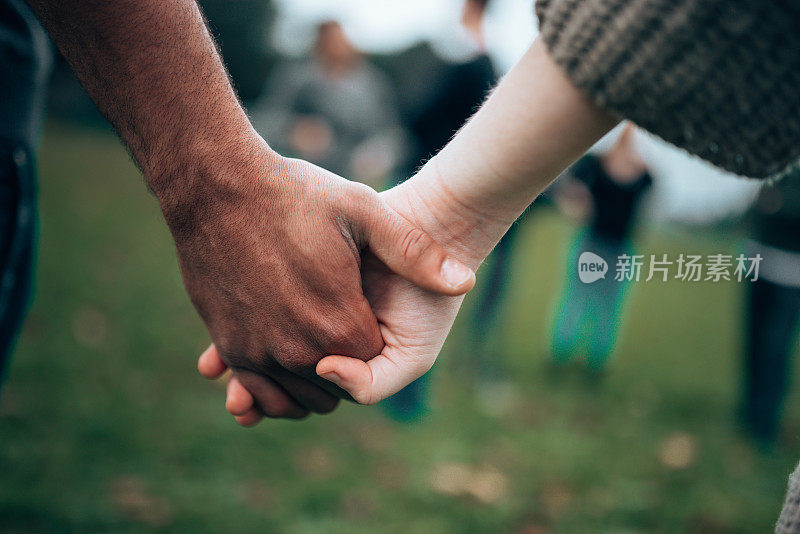 friends holding hands